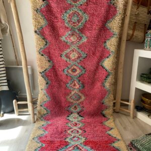 Photo d'un tapis Boucherouite en coton rose et turquoise.
