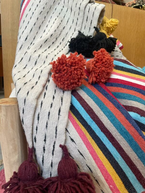 Plaid en coton rayer multicolores.