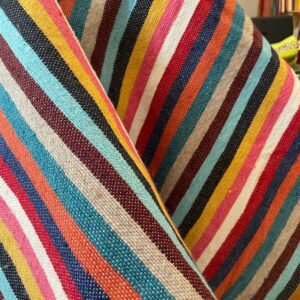 Plaid en coton rayer multicolores.
