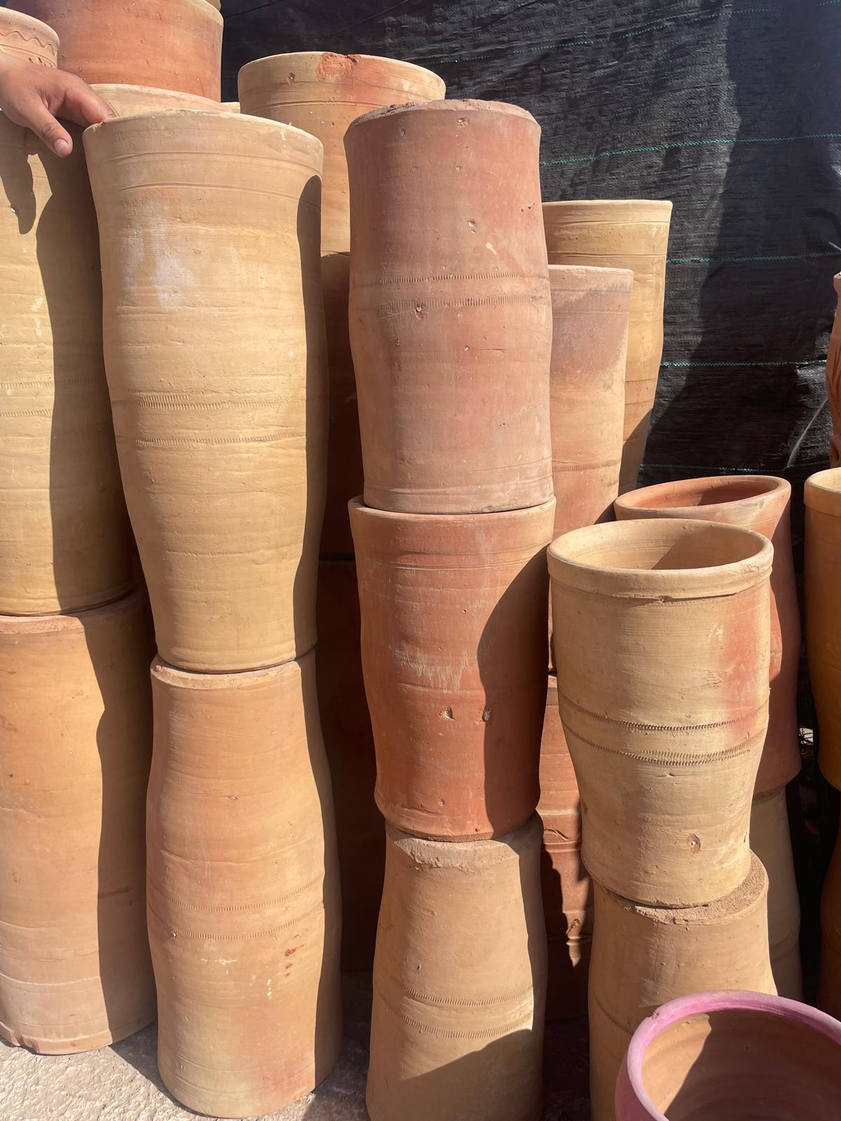 Poterie terre cuite format tubulaire artisanal cely-zya (5) Poterie tubulaire en terre cuite.